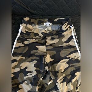 1 camouflage legging and 2 camouflage long sleeve hoodies (one says ‘Queen’